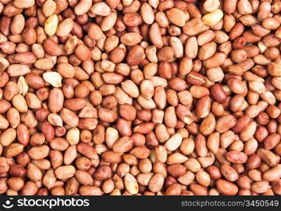 background of a heap of roasted peanuts