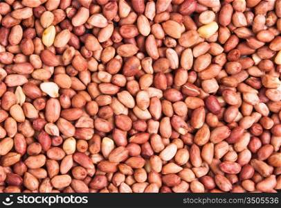background of a heap of roasted peanuts