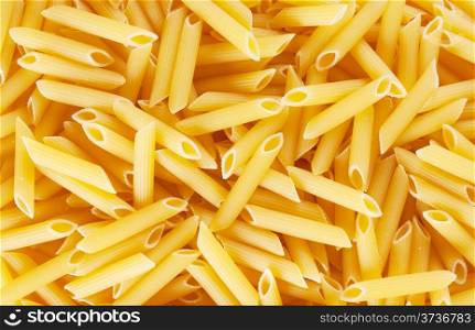 Background of a solid raw wheat pasta
