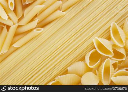 Background of a variety of tasty wheat pasta
