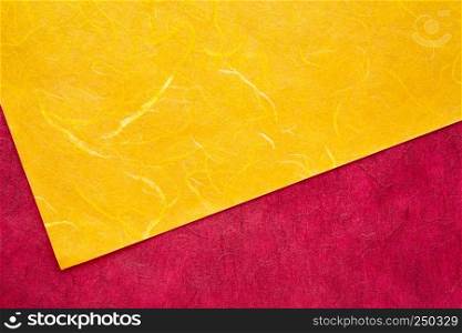 background of amber and red textured handmade mulberry papers