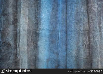 background of blue and gray rangichangi lokta paper handmade in Nepal