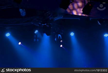 Background of blue spot light on concert stage