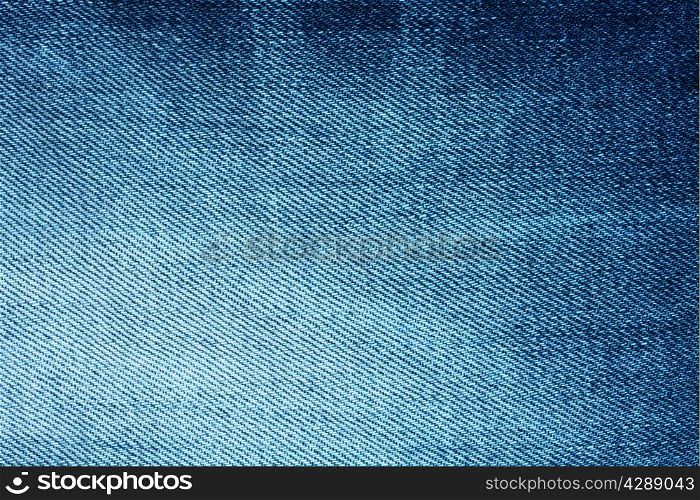 Background of bright blue denim with stripes and scuffed