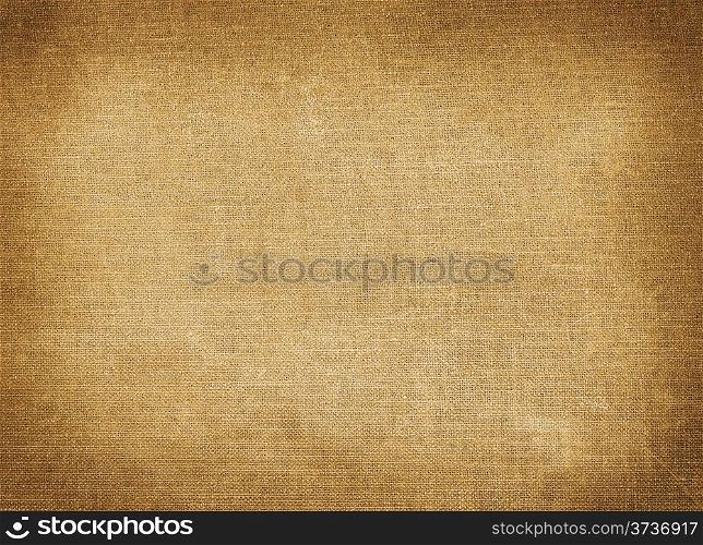 Background of brown coarse textile with tinted edges