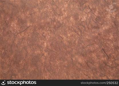 background of brown textured handmade mulberry paper