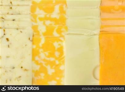 background of cheese tray slices in a vacuum package