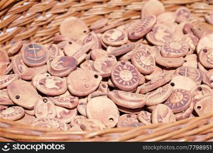 background of clay ornaments in a basket