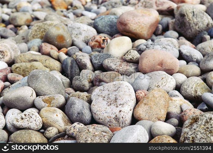 Background of colofrul beach pebbles of different shape and size