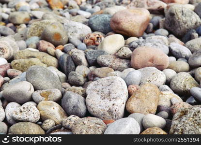 Background of colofrul beach pebbles of different shape and size