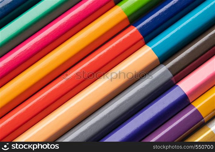 Background of colored wood pencils for children's creativity.. Background of colored wood pencils for children's creativity. close-up.