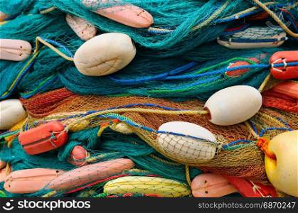background of colorful fishing nets and floats