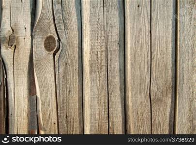 Background of cracked rough planks with knots