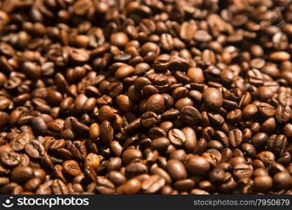 Background of delicious freshly roasted coffee beans