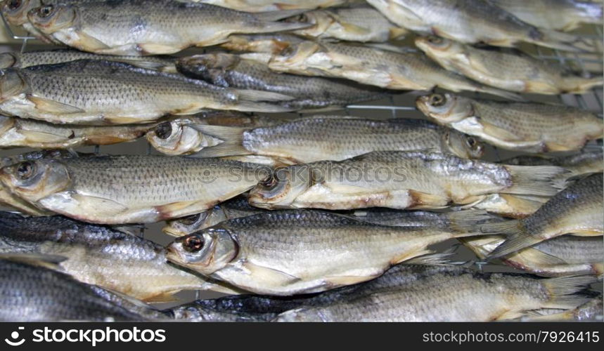 Background of dried fish. Nature fish. A bunch of fresh dried river fish.