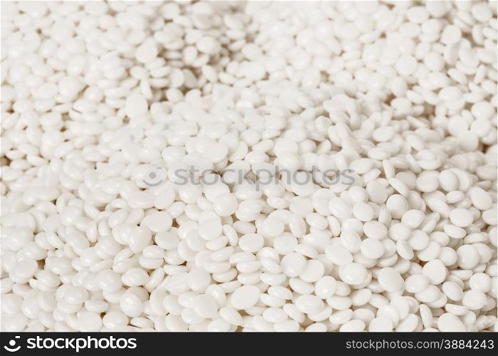 Background of fine white polymer granules