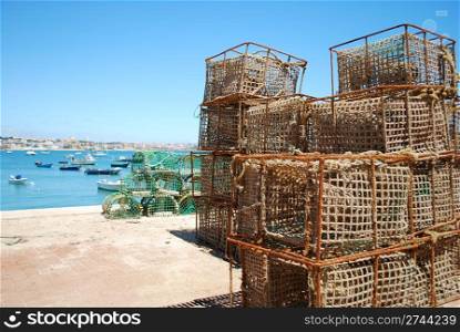background of fishing cages in the port of Cascais, Portugal