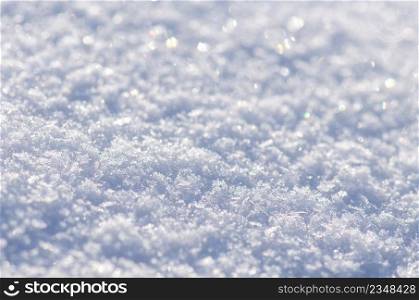 Background of fresh snow texture in blue tone. Background of fresh snow