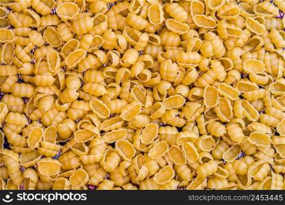 Background of gnocchi raw Italian pasta.. Background of gnocchi raw Italian pasta.