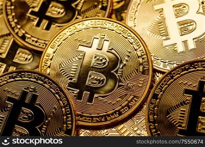 Background of gold coins with bitcoin sign isolated on white background. Background of bitcoins
