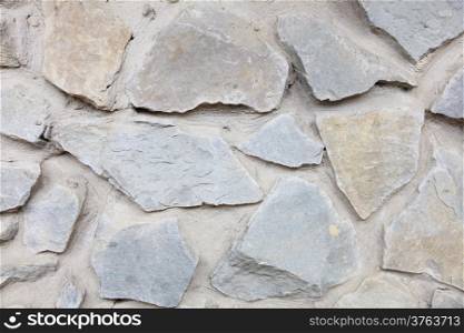 Background of gray stone wall texture pattern