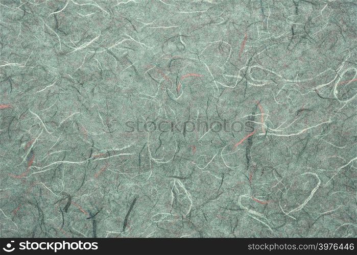 background of green textured handmade mulberry paper