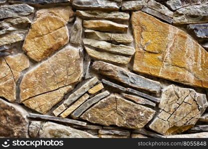 Background of hewn stone stacked in a wall