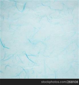 background of light blue textured handmade mulberry paper
