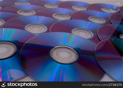 Background of Many Glowing CD Compact Discs