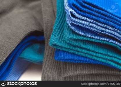 background of multi colored socks made of cotton