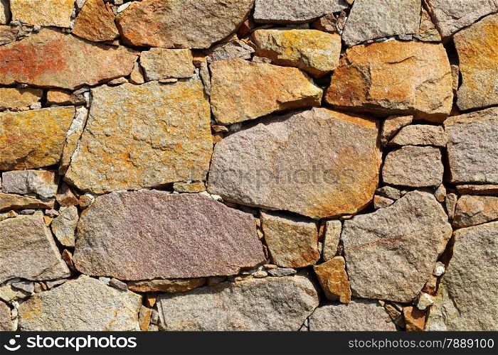Background of natural stone rock wall texture or cobblestone pavement detail