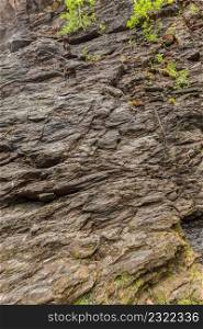 Background of natural stone wall texture rough rock surface. Background of stone wall texture rough rock surface