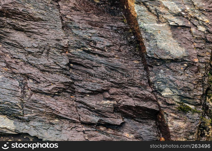 Background of natural stone wall texture rough rock surface. Background of stone wall texture rough rock surface