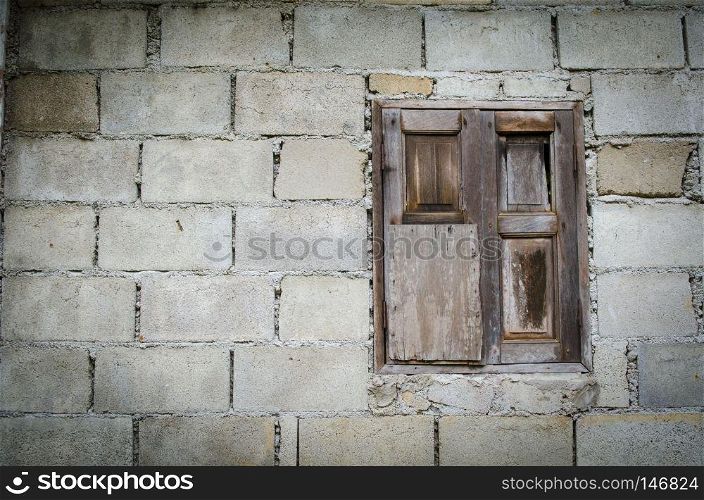 background of old brick wall with vintage window