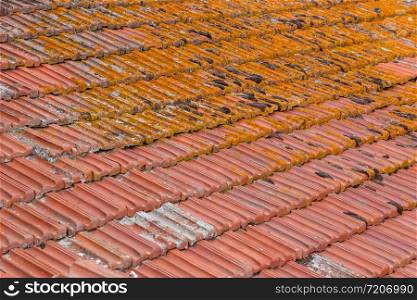 Background of old terracotta roof tiles in Tuscany, Italy