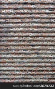 Background of old vintage brick wall in Tbilisi, Georgia. Old vintage brick wall background