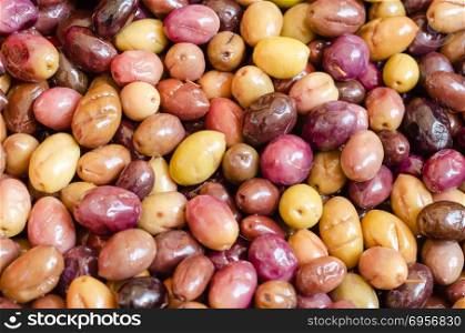 Background of olives close up,. Background of olives close up,group olives on the market bench