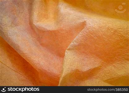 background of orange and red marbled momi paper