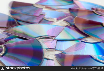 Background of Pieces of Broken CD Compact Discs