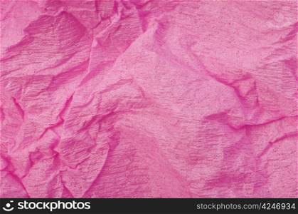 Background of pink old crumpled paper