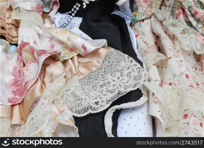 background of procelain dolls dresses