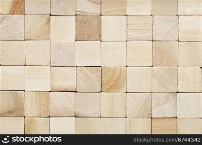 background of random wood square blocks with different grain