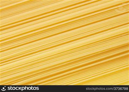 Background of raw delicious spaghetti diagonally