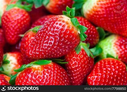 background of red big juicy ripe strawberries