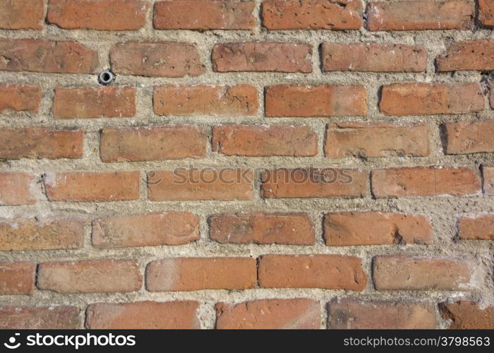 Background of red bricks wall with cement