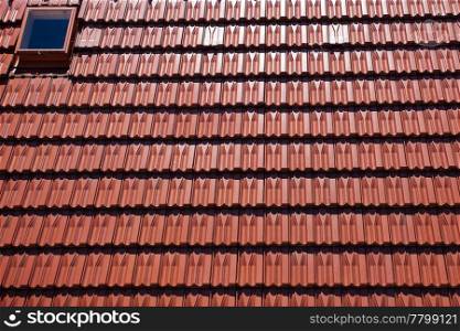 background of red tiled roof and window