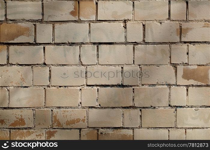 Background of rough dirty light gray brick wall texture.