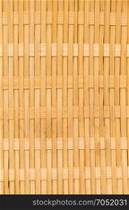 Background of rustic interlaced straw of a handmade craft.
