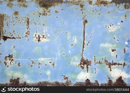 background of rusty metal with blue and white paint