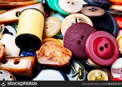 Background of sewing buttons. Large set of plastic buttons for clothing.Background made of buttons. Sewing elements